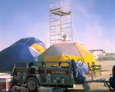 Our dome, the village's large event dome, and the village's scaffold.