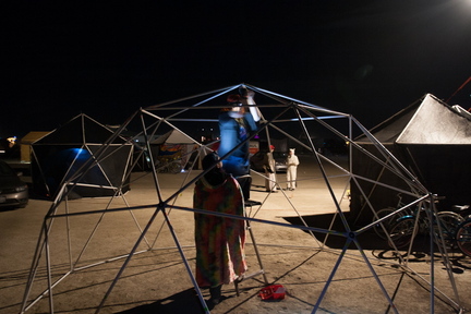 Putting the last bolt in the dome's skeleton.